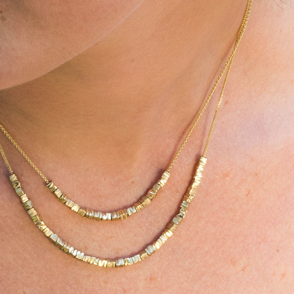 model with 218K Yellow Gold- Small 18+36 Smashed Beads Unique Necklaces