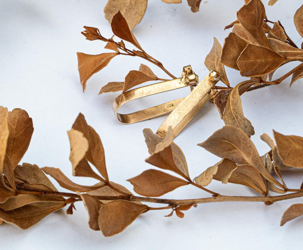 18K Gold Horseshoe-shaped Gypsy earrings.
