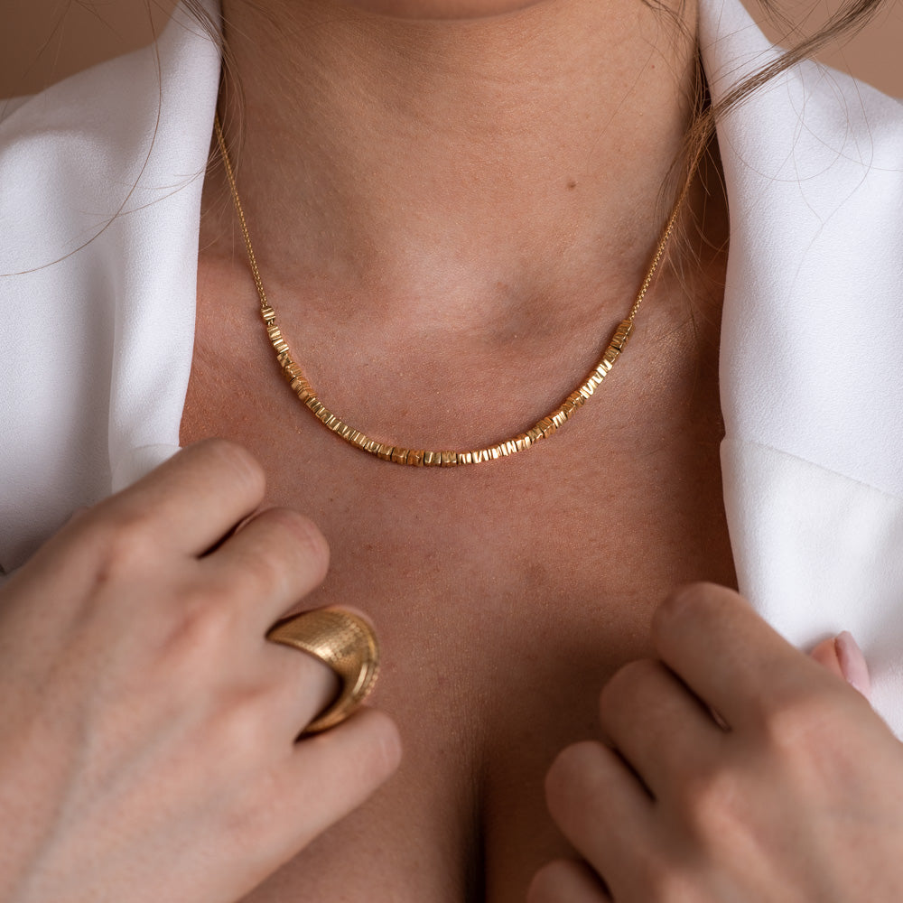 model with 18K Yellow Gold- Small 18 Smashed Beads Modern Necklace